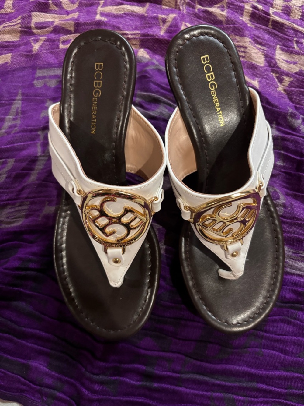 BCBGeneration White Thong Sandals with Gold Emblem